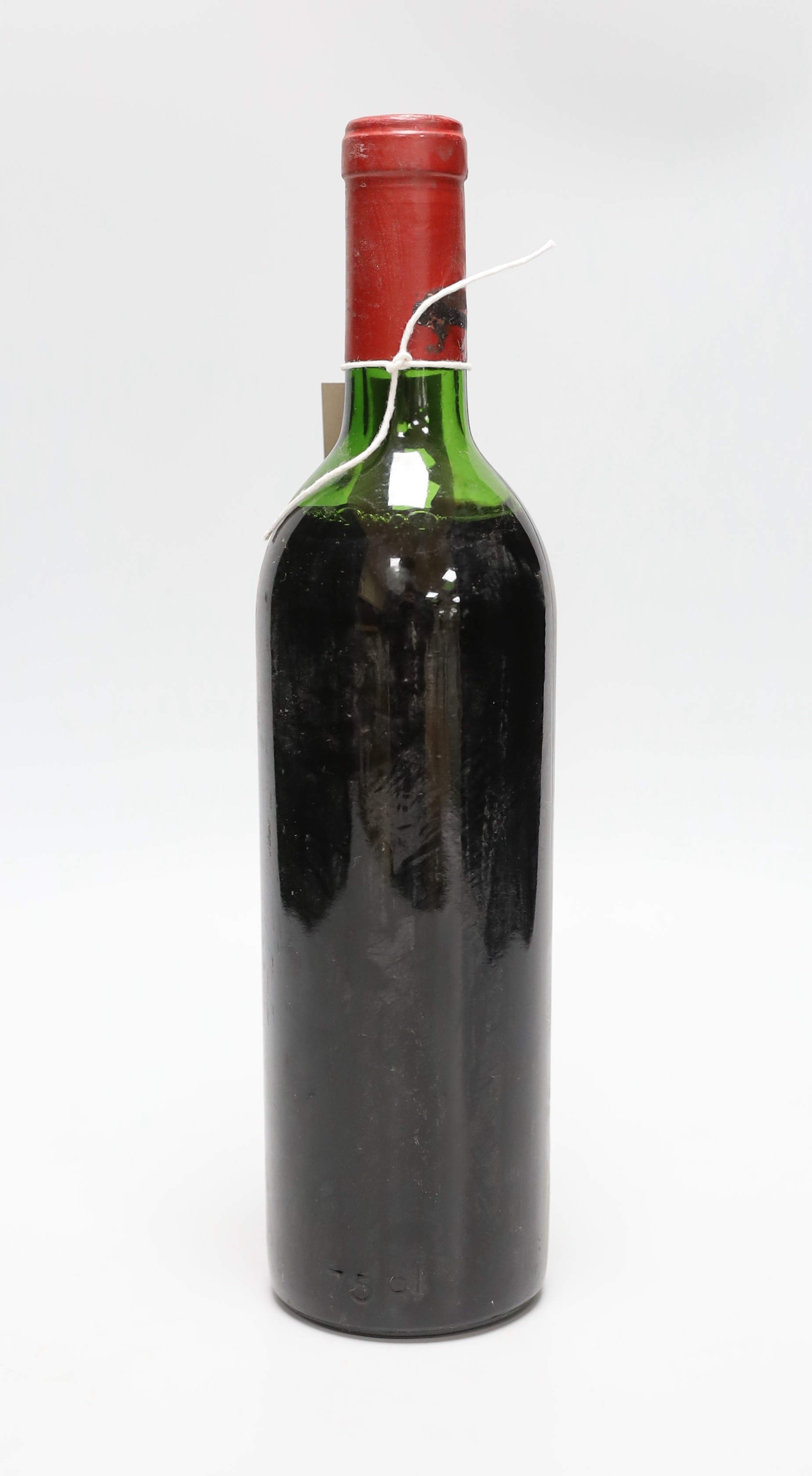 A bottle of Chateau Latour, lacks label